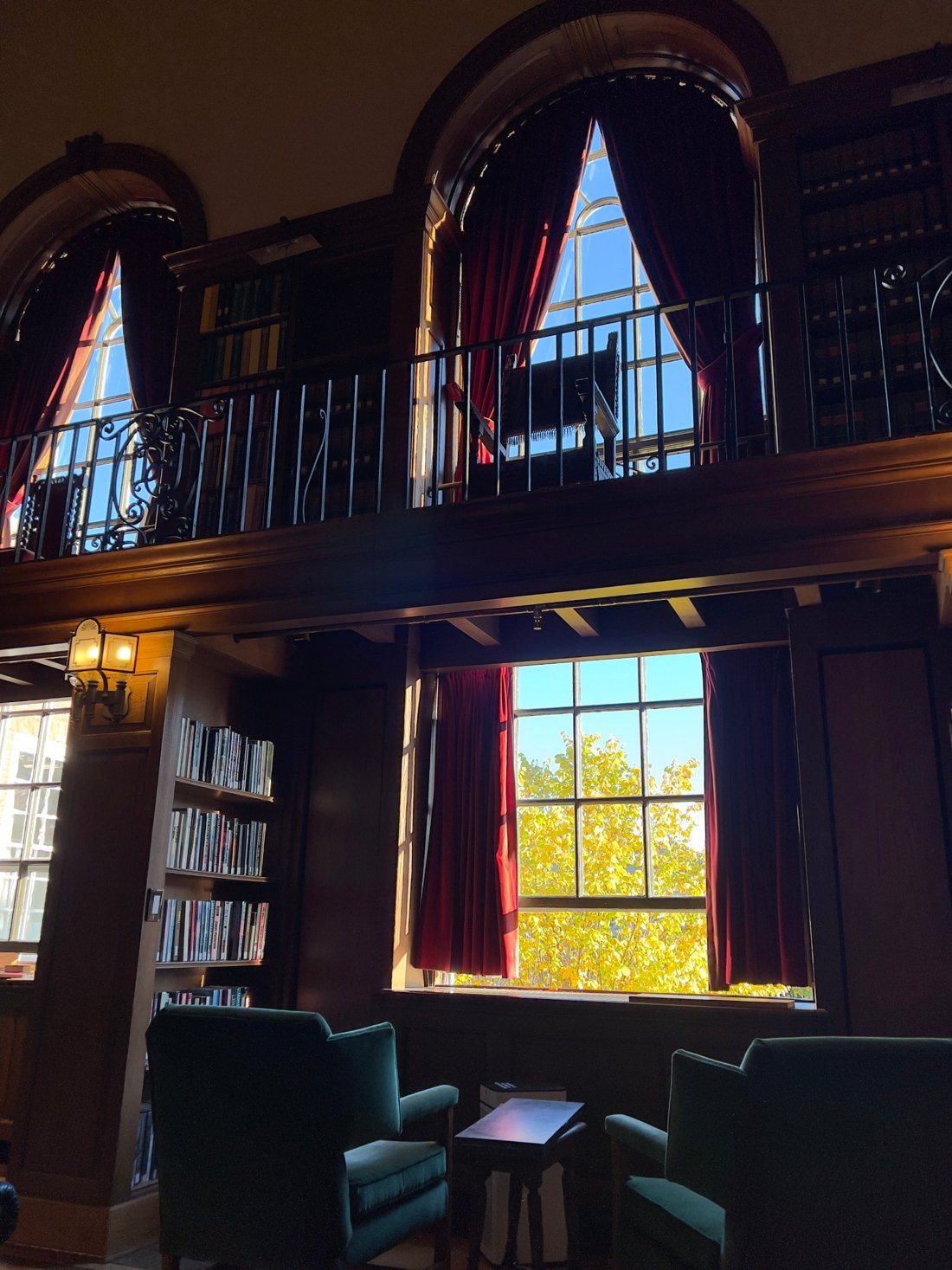 A Dartmouth reading room with autumn light through the windows